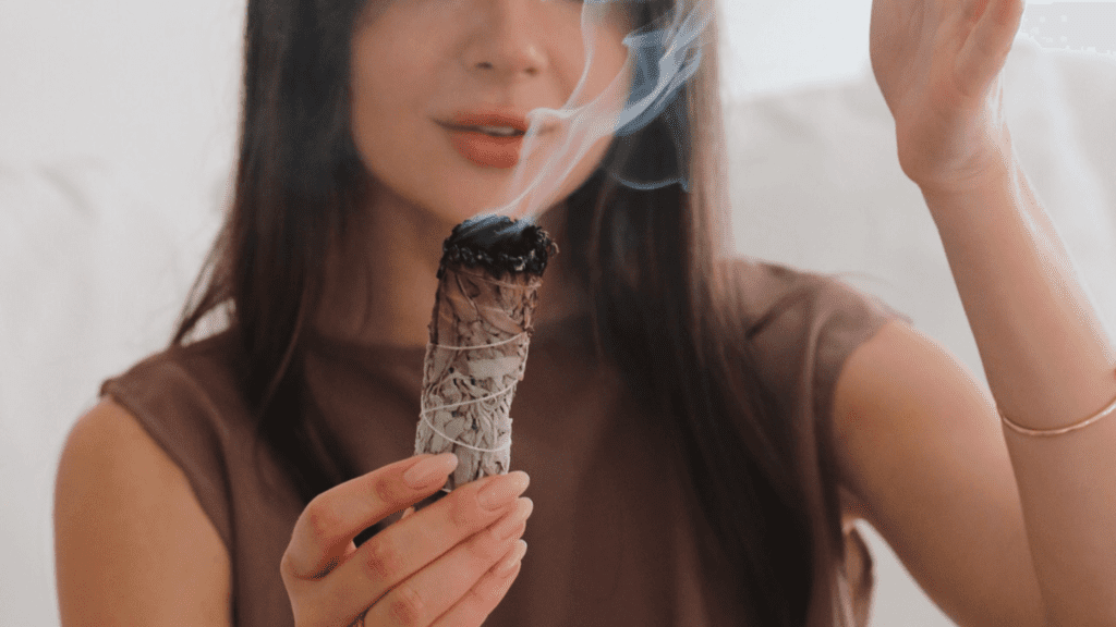 How to Burn White Sage: Step-by-Step Guide for Beginners Lady Showing How to Burn White Sage